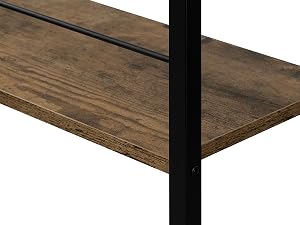 Wooden shelf or table top with a rustic, distressed finish. Dark metal support rod visible along the edge.