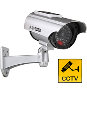 Wall-mounted outdoor security camera with infrared LEDs. Silver cylindrical body on adjustable bracket. Yellow CCTV warning sign included.