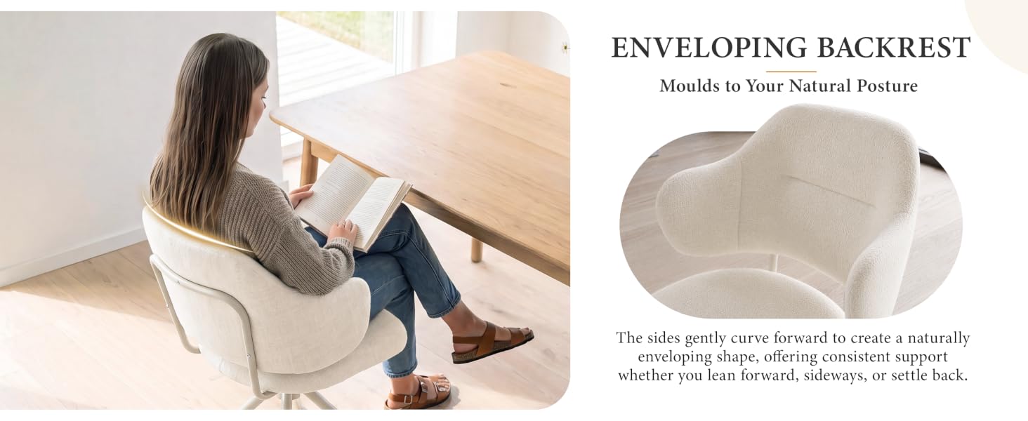 Text reads "ENVELOPING BACKREST" and "Womb-like your beloved Feature". Shows woman relaxing in cream-colored upholstered armchair in bright living room, demonstrating ergonomic seating design with supportive back cushioning.