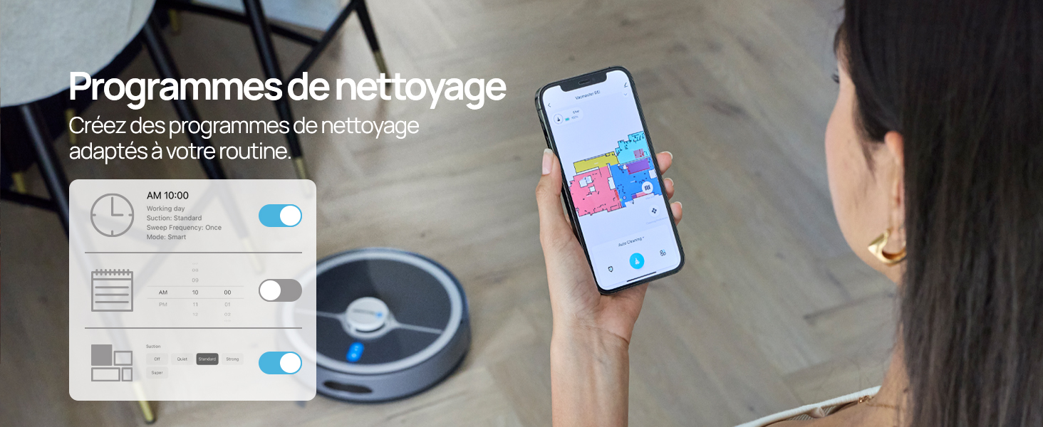 Le texte se lit comme suit : « Programmes de nettoyage ». Plan plat montrant un disque DVD, un smartphone affichant une interface bleue et un manuel d'instructions sur une surface grise. Configuration technique pour les programmes de nettoyage ou l'installation de logiciels.