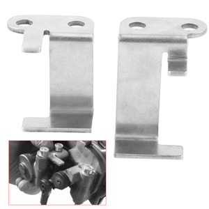 Collection of metal mounting brackets and hardware components shown against white background, includes various sizes of wall anchors and screws.