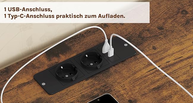 Schwarze Steckdosenleiste mit zwei Steckdosen im EU-Stil, einem USB-Anschluss und einem USB-C-Anschluss. Auf einer Holzoberfläche montiert und das weiße Ladekabel angeschlossen