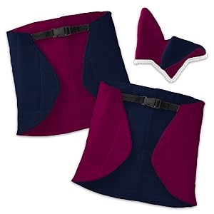 Reversible blanket with adjustable closure and two-tone hobby horse ear bonnet.