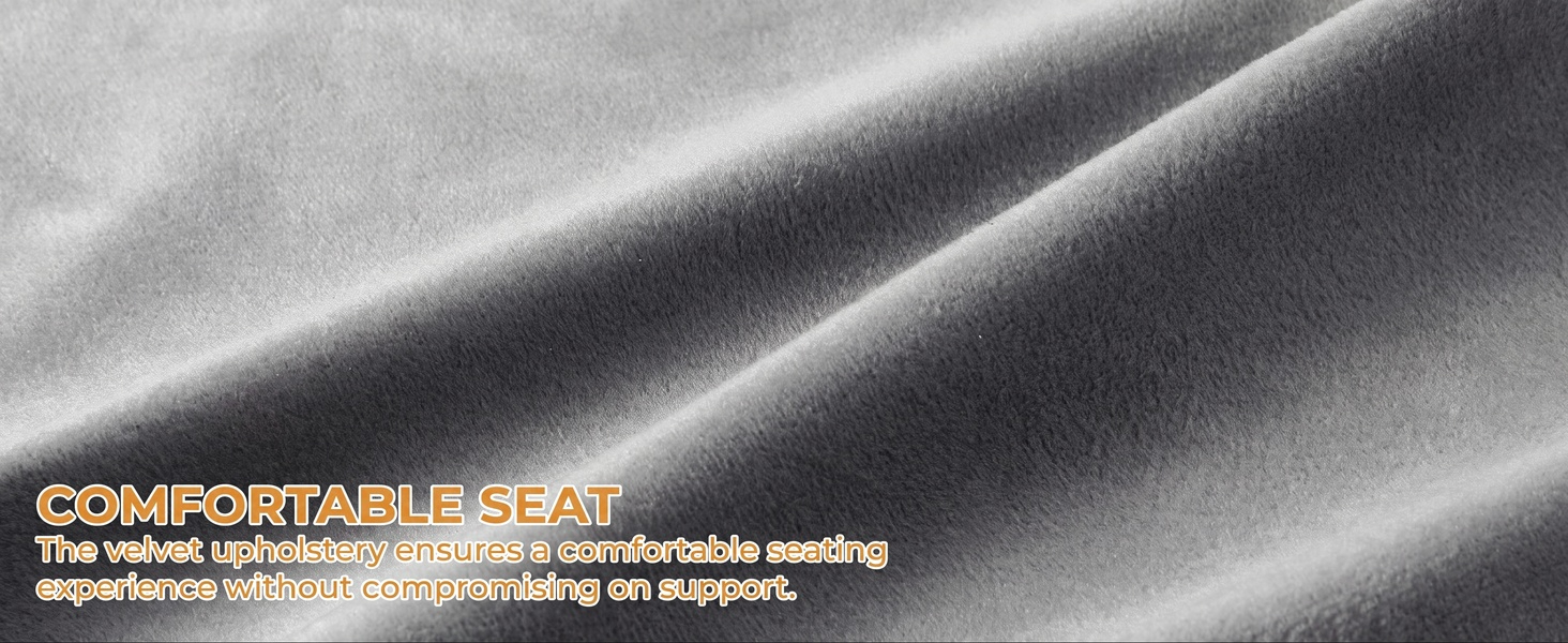 Text reads 'COMFORTABLE SEAL' and 'The weave: upholsterers use this comfortable seating experience often seen on expensive couches' (partial text visible). Close-up of gray fabric texture showing weave pattern.