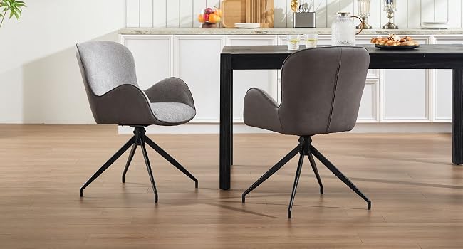 Sala da pranzo contemporanea con moderne sedie imbottite grigie con caratteristiche gambe angolari contro pavimenti in legno chiaro e pareti bianche.