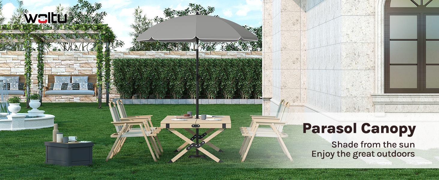 Outdoor parasol canopy with green fabric cover. Shown in garden setting with picnic tables. Text indicates 'Parasol Canopy' product name.