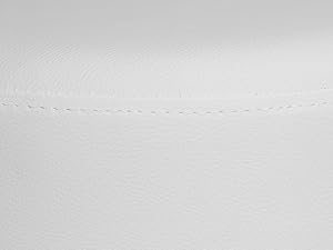 Close-up detail of white stitching pattern on a light-colored surface, showing neat parallel lines of thread work.