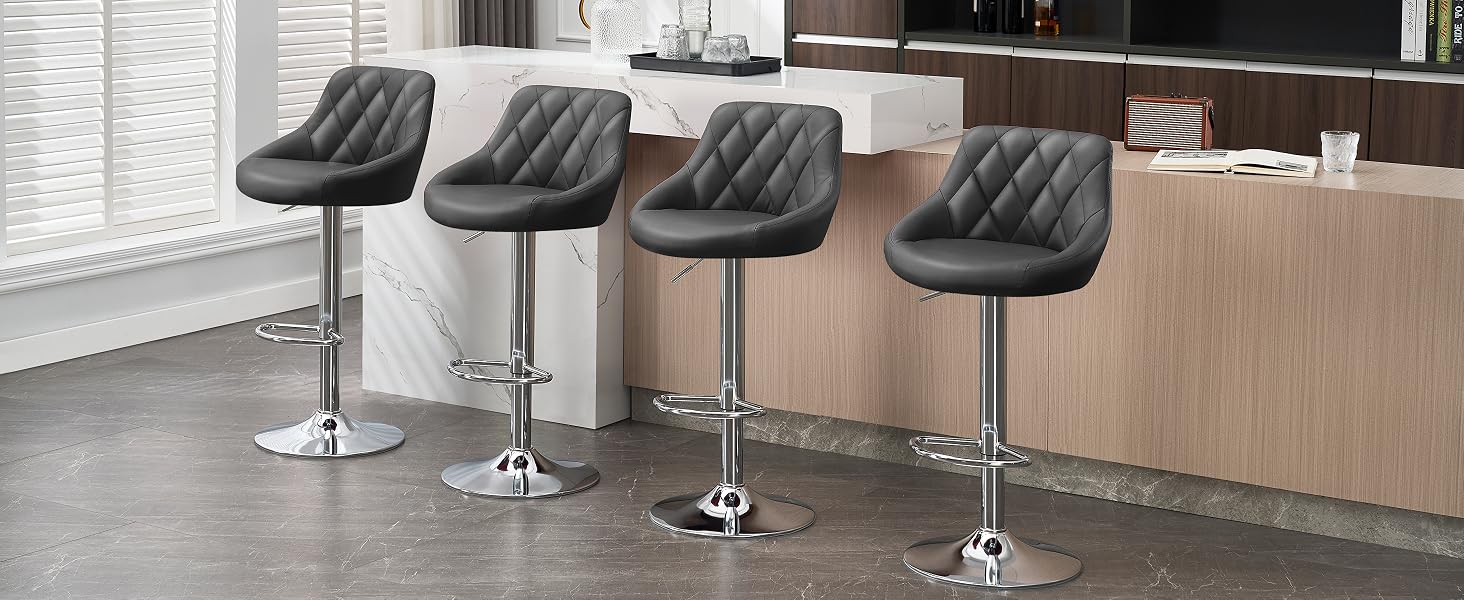 Four adjustable-height bar stools with black padded seats and backrests, featuring a quilted diamond pattern.