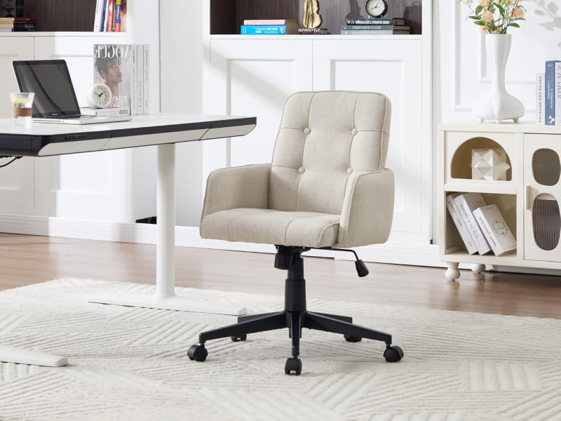 Modern office space featuring white upholstered desk chairs and glass-top table in a bright, minimalist setting with natural lighting.