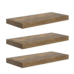 Three identical floating wooden shelves with a rustic, weathered appearance. Each shelf is rectangular with a thick, solid construction.
