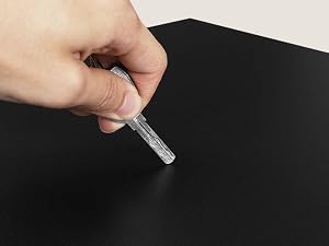Close-up sequence showing hands using small dropper or applicator on dark surface, demonstrating product application process across multiple steps.