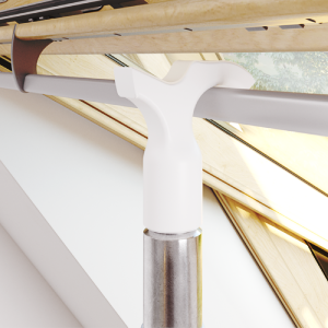 Close-up of a white T-shaped support structure, possibly for furniture or shelving. Metal and wood components visible.