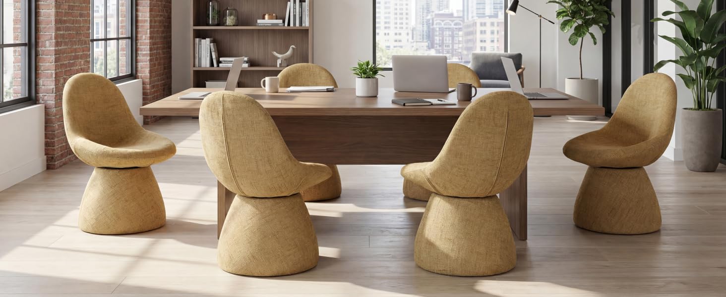Modern dining set featuring woven natural-colored chairs and round table in an open, contemporary indoor space with large windows.