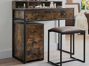 Rustic wooden vanity with tri-fold mirror, multiple drawers, and a matching stool. Industrial-style metal frame and accents. Positioned in a bright room with curtains.
