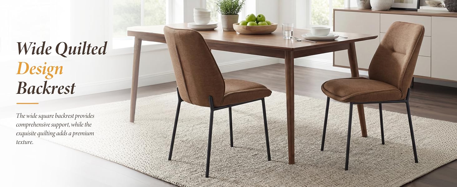Text reads 'Wide-Quilted Back Backrest'. Dining table with two brown upholstered chairs featuring quilted backrests on light area rug in modern kitchen setting.