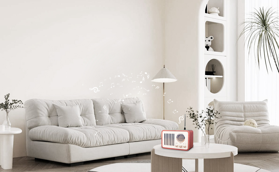 a white living room with a white sofa and a white coffee table.