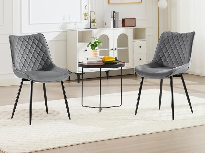 a pair of chairs in a living room