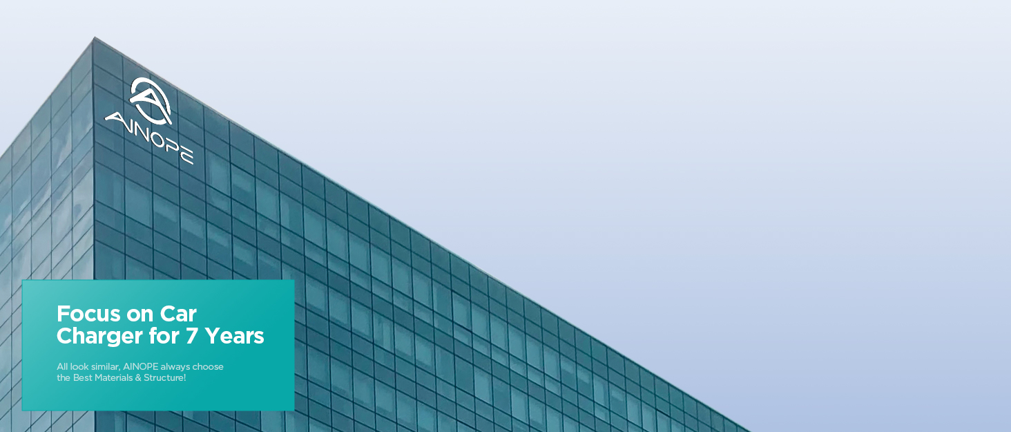 a building with a blue glass facade and a white sign that says ` ` the building is a business center.'' 