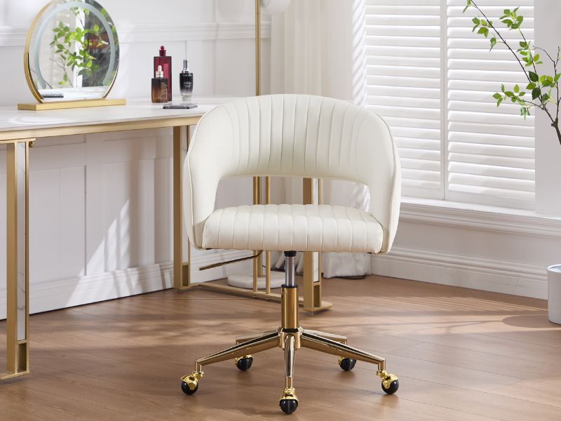 Interior room photos showing white walls, hardwood flooring, and gold-colored furniture including what appears to be office chairs or seating.
