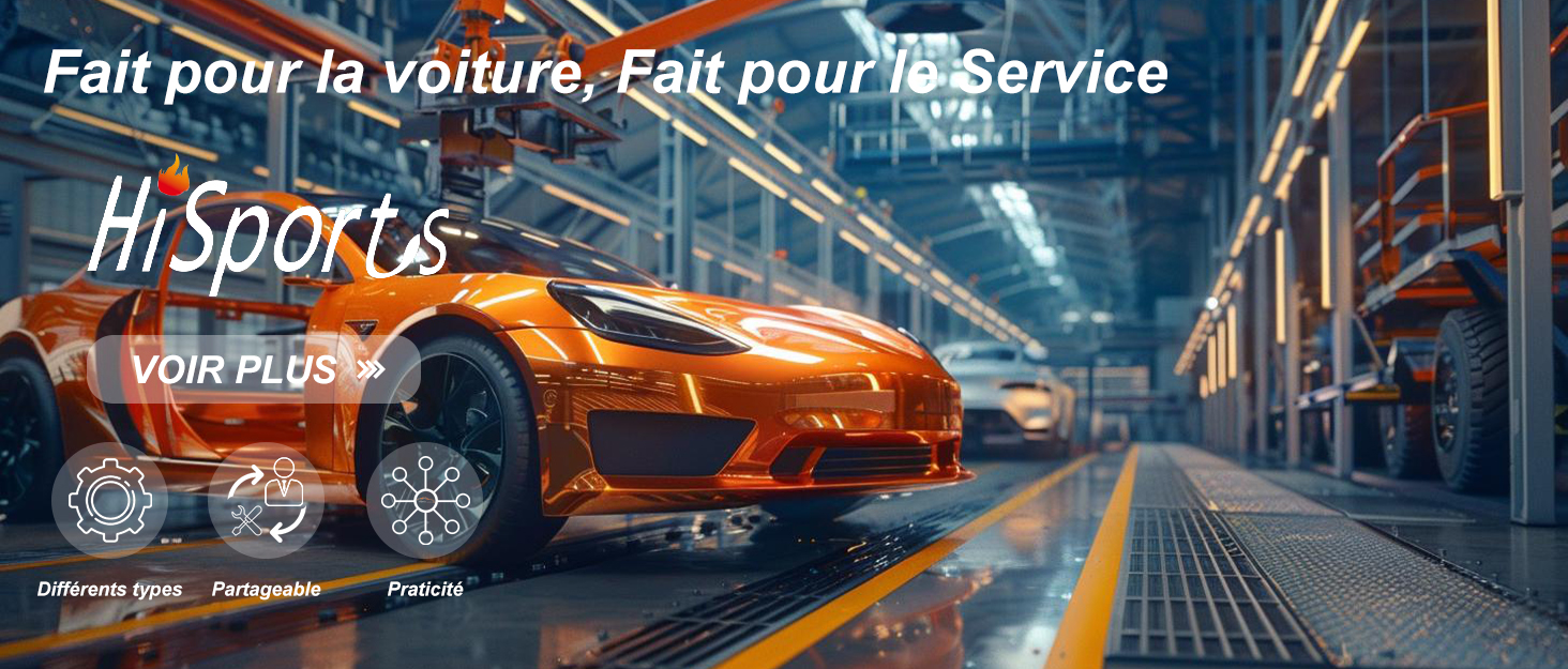 Orange sports car in industrial warehouse setting with French text. Car features custom wheels and sporty styling against blue-tinted warehouse background with yellow floor markings.