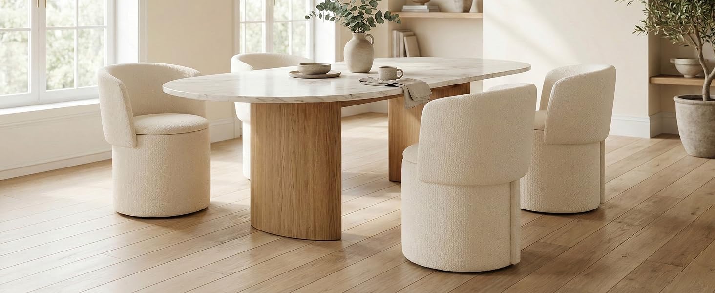 Identical dining setup as Image 1 - round white marble table with wooden base and four cream upholstered swivel chairs in modern interior setting.