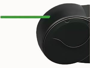 Close-up views of a black plastic component with curved design elements and a green indicator or accent line visible in one view.