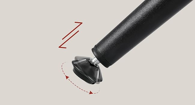 Nahaufnahme einer schwarzen zylindrischen Werkzeugspitze mit strukturiertem Griffende vor hellem Hintergrund, Detailansicht des Griffs.