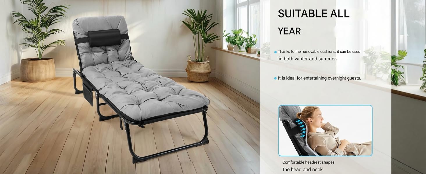 Text reads 'SUITABLE ALL YEAR'. Folding guest bed with gray cushioned mattress shown in room setting with hardwood floors and plants. Demonstrates comfortable lounging position.