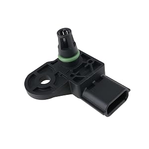 Black plastic bicycle component or bracket with green indicator dot, threaded connector, and central mounting hole, sensor or valve-related part.