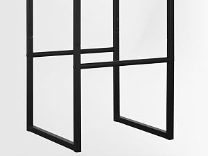 a black framed mirror with a white background.