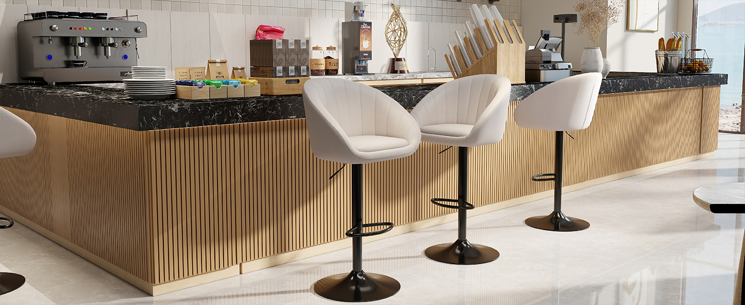 Modern restaurant or bar interior featuring wood slat wall paneling and black bar stools arranged along a counter space. Clean, minimalist design aesthetic.