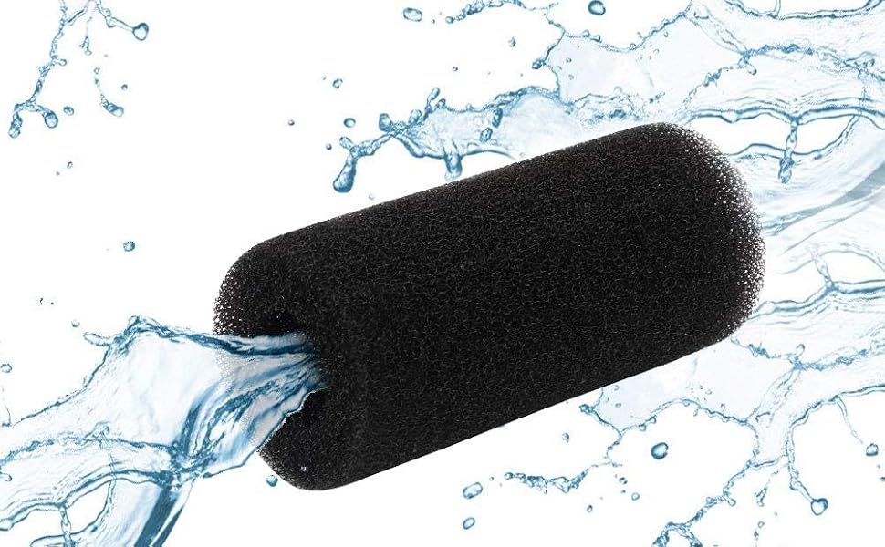 Black foam filter submerged in water with splashes and bubbles, demonstrating water resistance or filtration properties.