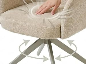 Les mains de la personne touchant le pouf rond rembourré blanc avec pieds croisés en métal gris sur fond clair.
