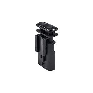 Multiple angles of a black plastic clip or mounting bracket, showing different views of its construction and design.
