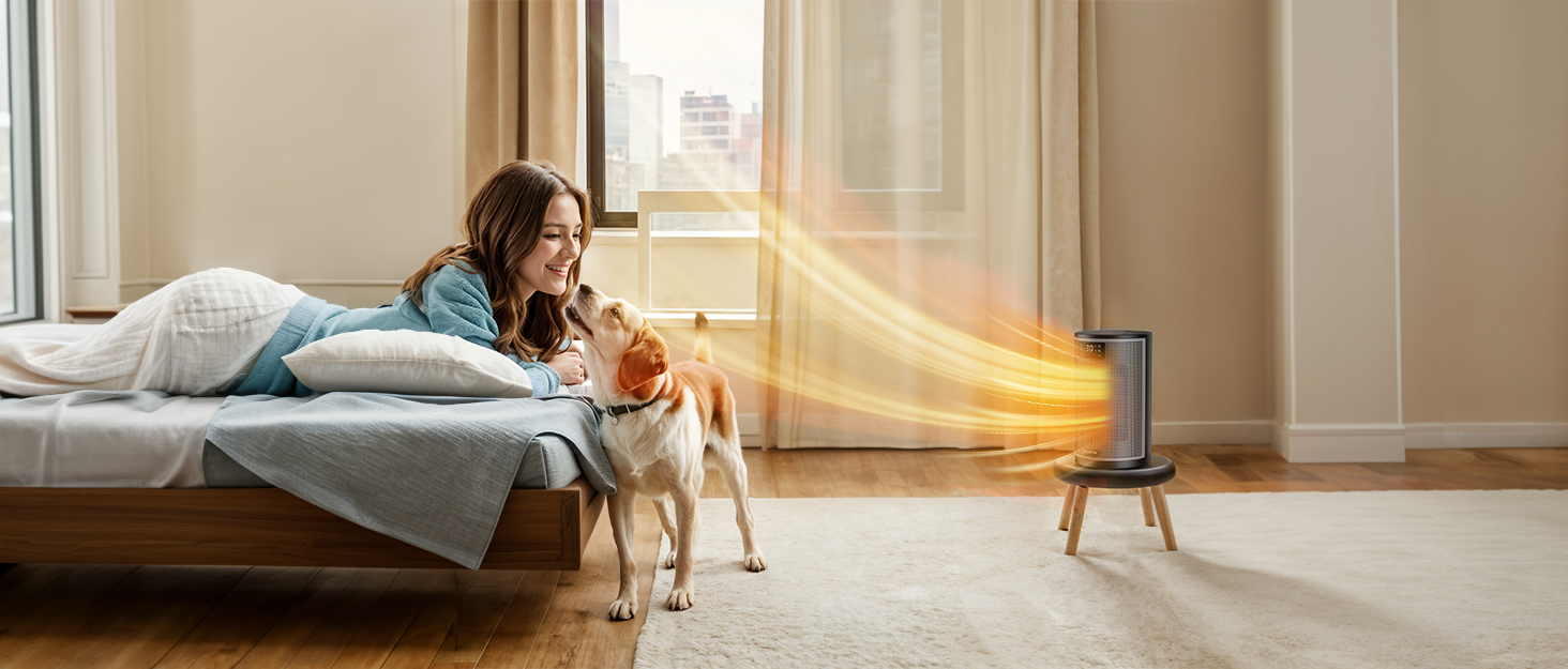 A person lying on a couch with a dog, facing a device emitting a beam of light. The room has warm, neutral tones.