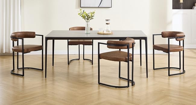 Multiple industrial-style tables with wooden tops and black metal frames arranged in open space with light flooring.
