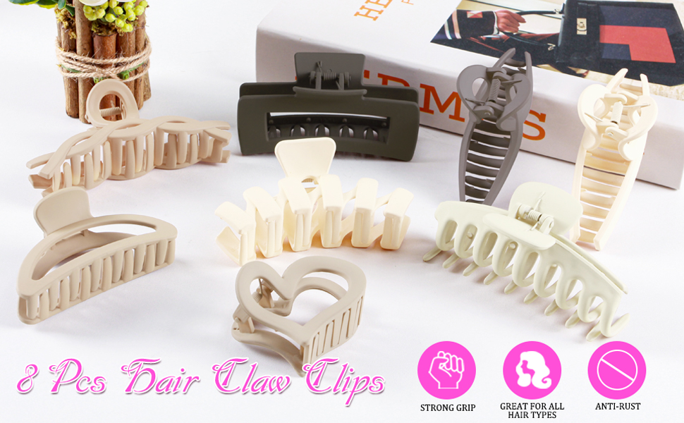 Collection of cream-colored plastic hair claw clips in various sizes arranged on white surface, with product packaging visible.
