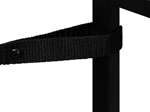 Close-up of a black webbed strap attached to a dark metal frame or furniture piece, showing texture and connection details.