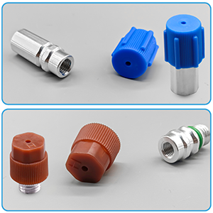Assortment of small metal and plastic connectors or fittings. Blue, brown, and silver components with threaded ends and knurled caps for grip.
