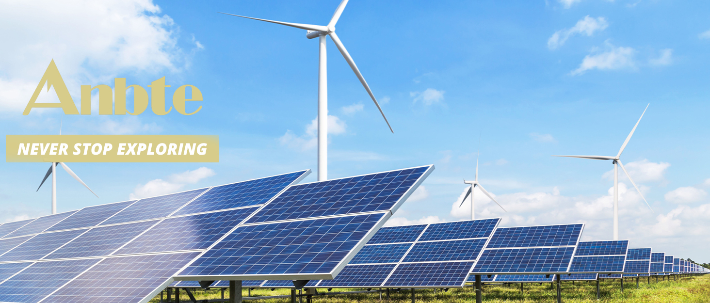 Text reads 'Antole' and 'NEVER STOP EXPLORING'. Large solar panel array in foreground with multiple wind turbines visible in background against blue sky with white clouds.