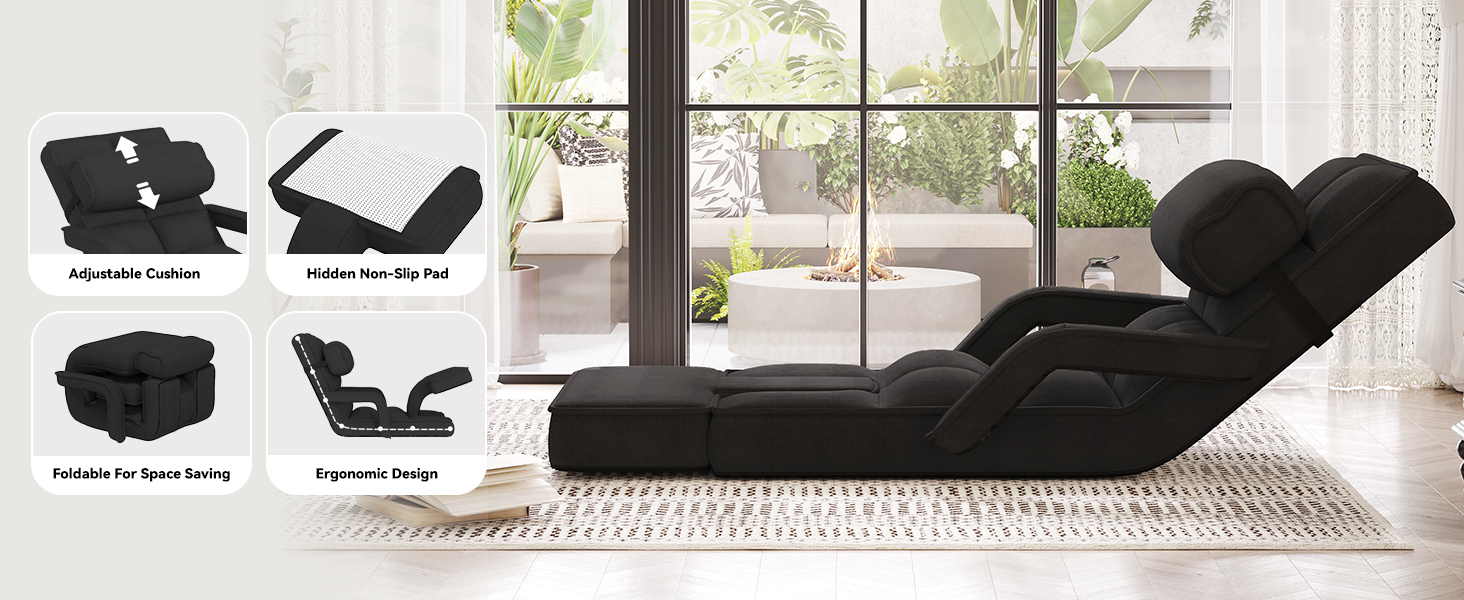 a black leather sofa in a living room with a fireplace.