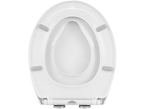 a close up of a white toilet bowl.