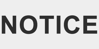 A white sign or banner with large black text displaying the word 'NOTICE'.