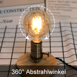 Ampoule de style vintage à filament visible, allumée et montée sur un socle en bois. Le texte indique un angle de faisceau de 360 degrés