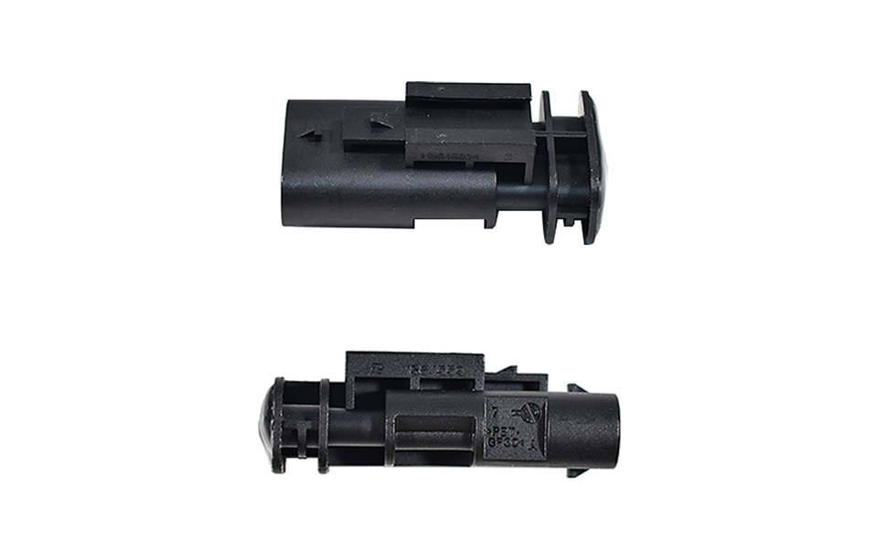 Technical product views showing multiple angles of what appears to be a black mechanical or electronic component with various connection points.