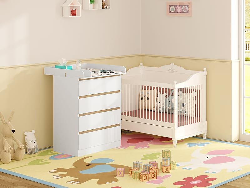 baby room with a baby bed and a dresser