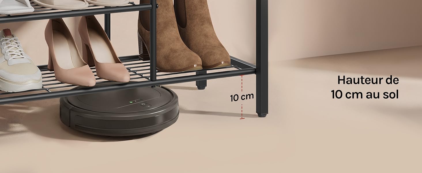 Le texte indique « Hauteur de 10 cm au sol ». Gros plan montrant des pieds marchant sur ou à proximité d'un tapis circulaire foncé ou d'une surface de marche sur un sol blanc.