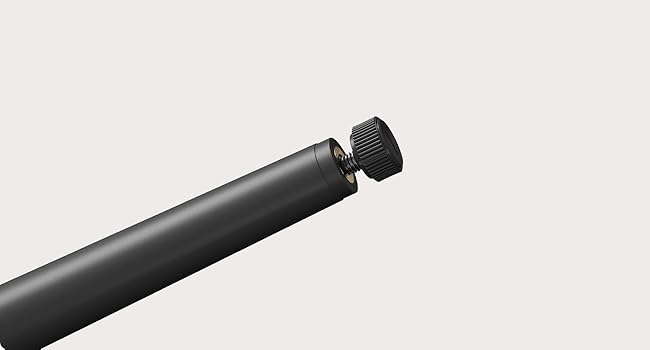 Multiple views of a black cylindrical electronic device or accessory shown from different angles against white background.