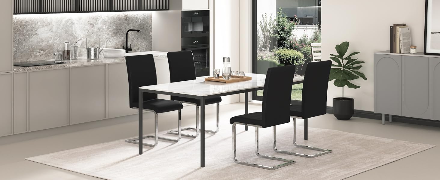 Modern dining set in open-plan kitchen: glass-top table with six black chairs, white cabinets, and potted plant for decor.