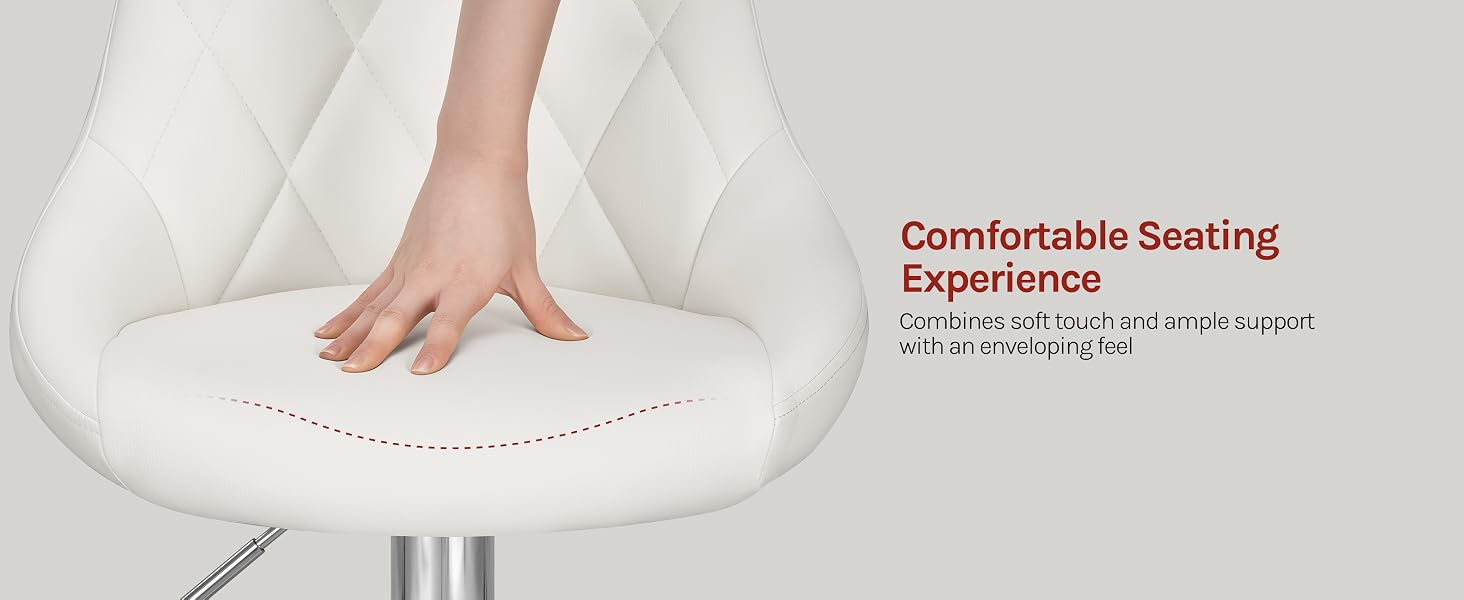 Text reads 'Comfortable Seating Experience' with additional text in another language. Close-up of hand pressing into white quilted mattress surface demonstrating comfort and cushioning.